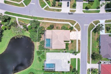 Corner Lot! Beautiful Pool and Lakefront View. Porcelain and on Winston Trails Golf Course in Florida - for sale on GolfHomes.com, golf home, golf lot