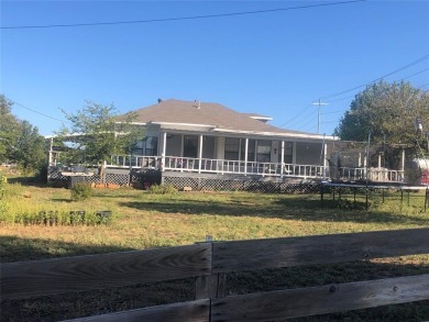 Golf Course Road Cottage- This home on 1.49 acres has just on San Saba River Golf Course in Texas - for sale on GolfHomes.com, golf home, golf lot