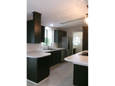 Adorable Move-In Ready Home with Many Upgraded Features! Comes on Tomoka Oaks Golf and Country Club in Florida - for sale on GolfHomes.com, golf home, golf lot