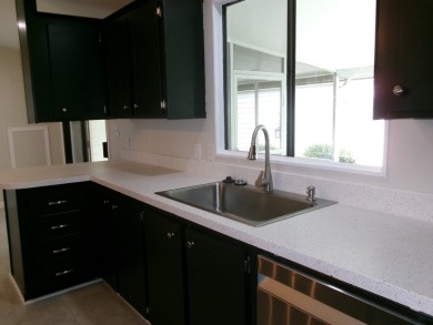 Adorable Move-In Ready Home with Many Upgraded Features! Comes on Tomoka Oaks Golf and Country Club in Florida - for sale on GolfHomes.com, golf home, golf lot