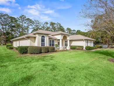 This exquisitely updated 3 bedroom 2 bath pool home is located on Golden Hills Golf and Turf Club in Florida - for sale on GolfHomes.com, golf home, golf lot
