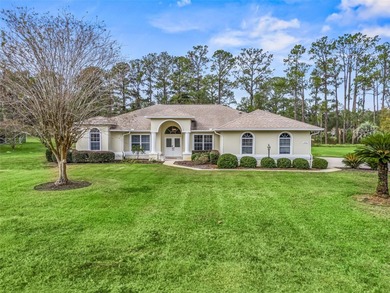 This exquisitely updated 3 bedroom 2 bath pool home is located on Golden Hills Golf and Turf Club in Florida - for sale on GolfHomes.com, golf home, golf lot