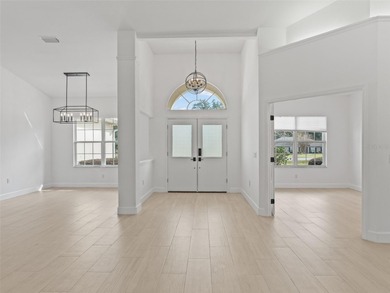 This exquisitely updated 3 bedroom 2 bath pool home is located on Golden Hills Golf and Turf Club in Florida - for sale on GolfHomes.com, golf home, golf lot