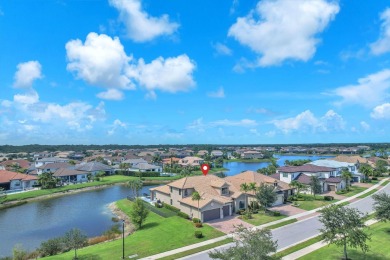 This stunning waterfront home, situated on a rare, ultra-premium on Jupiter Country Club in Florida - for sale on GolfHomes.com, golf home, golf lot