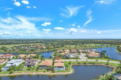This stunning waterfront home, situated on a rare, ultra-premium on Jupiter Country Club in Florida - for sale on GolfHomes.com, golf home, golf lot