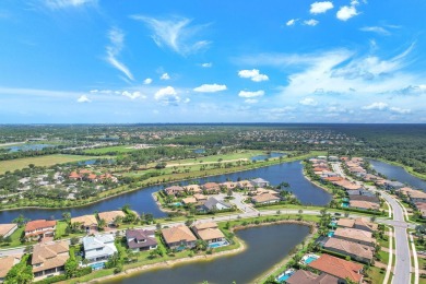 This stunning waterfront home, situated on a rare, ultra-premium on Jupiter Country Club in Florida - for sale on GolfHomes.com, golf home, golf lot