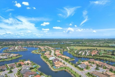 This stunning waterfront home, situated on a rare, ultra-premium on Jupiter Country Club in Florida - for sale on GolfHomes.com, golf home, golf lot