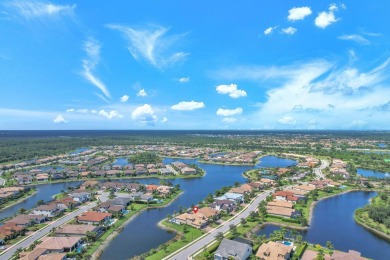 This stunning waterfront home, situated on a rare, ultra-premium on Jupiter Country Club in Florida - for sale on GolfHomes.com, golf home, golf lot