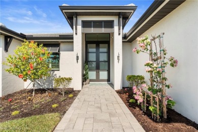 This stunning home offers a unique open-concept design, making on Royal Tee Country Club in Florida - for sale on GolfHomes.com, golf home, golf lot