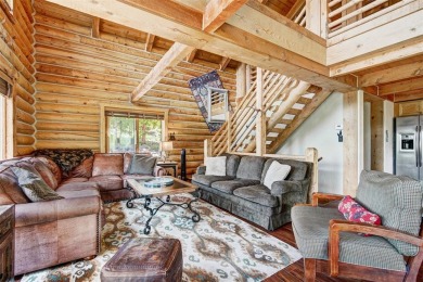 This log home comes fully furnished and is a true mountain on Raven Golf Club At Three Peaks in Colorado - for sale on GolfHomes.com, golf home, golf lot