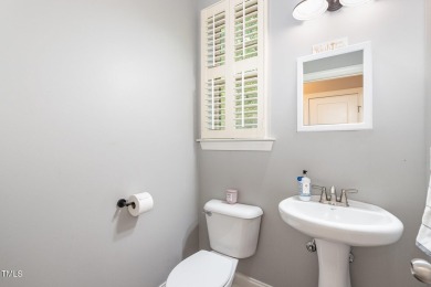 Welcome to this beautifully maintained 4-bedroom, 3.5-bath home on Heritage Golf Club in North Carolina - for sale on GolfHomes.com, golf home, golf lot