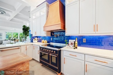 Stunning Luxury waterfront pool home in exclusive Weston Hills on Weston Hills Country Club in Florida - for sale on GolfHomes.com, golf home, golf lot