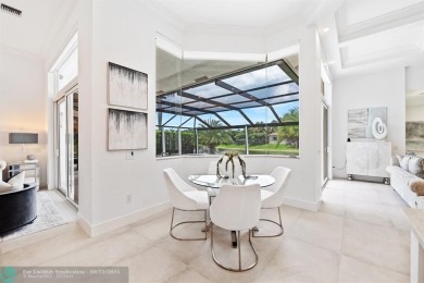Stunning Luxury waterfront pool home in exclusive Weston Hills on Weston Hills Country Club in Florida - for sale on GolfHomes.com, golf home, golf lot