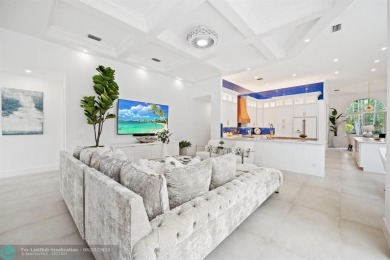 Stunning Luxury waterfront pool home in exclusive Weston Hills on Weston Hills Country Club in Florida - for sale on GolfHomes.com, golf home, golf lot