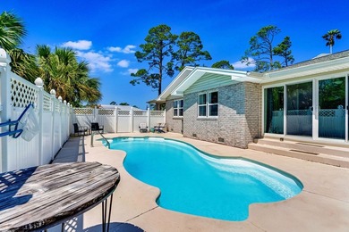 NEW PRICE + NEW METAL ROOF! Pool home just minutes from the on Saint Josephs Bay Country Club in Florida - for sale on GolfHomes.com, golf home, golf lot