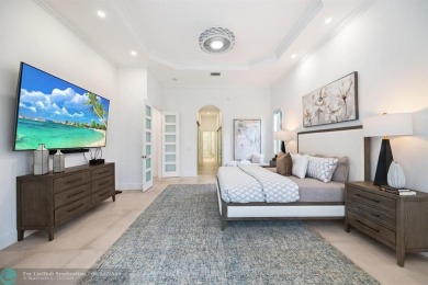 Stunning Luxury waterfront pool home in exclusive Weston Hills on Weston Hills Country Club in Florida - for sale on GolfHomes.com, golf home, golf lot
