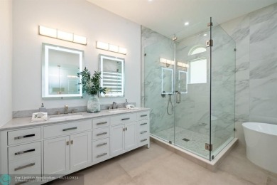 Stunning Luxury waterfront pool home in exclusive Weston Hills on Weston Hills Country Club in Florida - for sale on GolfHomes.com, golf home, golf lot