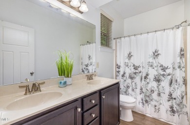 Welcome to this beautifully maintained 4-bedroom, 3.5-bath home on Heritage Golf Club in North Carolina - for sale on GolfHomes.com, golf home, golf lot