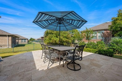 Step into elegance and comfort with this beautifully appointed on Frisco Lakes Golf Course in Texas - for sale on GolfHomes.com, golf home, golf lot