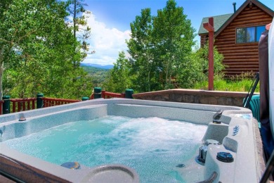 This log home comes fully furnished and is a true mountain on Raven Golf Club At Three Peaks in Colorado - for sale on GolfHomes.com, golf home, golf lot