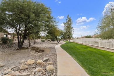 Nestled in a vibrant gated active adult community, this stunning on Palo Verde Golf and Country Club in Arizona - for sale on GolfHomes.com, golf home, golf lot