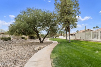 Nestled in a vibrant gated active adult community, this stunning on Palo Verde Golf and Country Club in Arizona - for sale on GolfHomes.com, golf home, golf lot