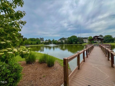Welcome to this beautifully maintained 4-bedroom, 3.5-bath home on Heritage Golf Club in North Carolina - for sale on GolfHomes.com, golf home, golf lot
