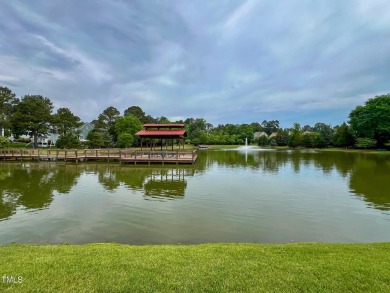 Welcome to this beautifully maintained 4-bedroom, 3.5-bath home on Heritage Golf Club in North Carolina - for sale on GolfHomes.com, golf home, golf lot