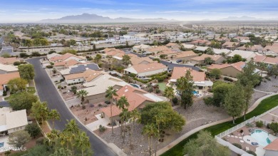 Nestled in a vibrant gated active adult community, this stunning on Palo Verde Golf and Country Club in Arizona - for sale on GolfHomes.com, golf home, golf lot