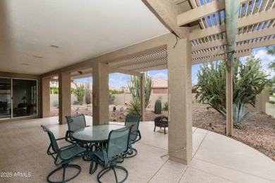 Nestled in a vibrant gated active adult community, this stunning on Palo Verde Golf and Country Club in Arizona - for sale on GolfHomes.com, golf home, golf lot