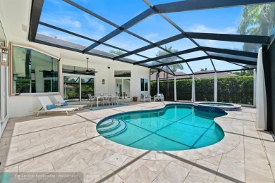 Stunning Luxury waterfront pool home in exclusive Weston Hills on Weston Hills Country Club in Florida - for sale on GolfHomes.com, golf home, golf lot
