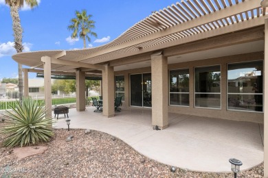 Nestled in a vibrant gated active adult community, this stunning on Palo Verde Golf and Country Club in Arizona - for sale on GolfHomes.com, golf home, golf lot