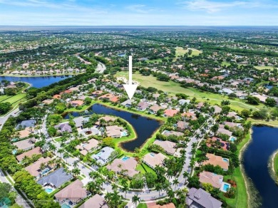 Stunning Luxury waterfront pool home in exclusive Weston Hills on Weston Hills Country Club in Florida - for sale on GolfHomes.com, golf home, golf lot