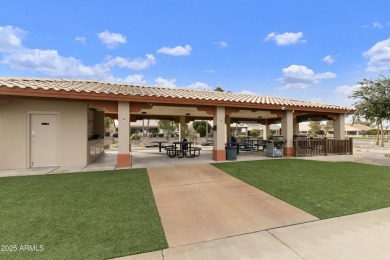 Nestled in a vibrant gated active adult community, this stunning on Palo Verde Golf and Country Club in Arizona - for sale on GolfHomes.com, golf home, golf lot