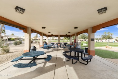 Nestled in a vibrant gated active adult community, this stunning on Palo Verde Golf and Country Club in Arizona - for sale on GolfHomes.com, golf home, golf lot