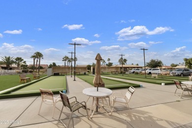 Nestled in a vibrant gated active adult community, this stunning on Palo Verde Golf and Country Club in Arizona - for sale on GolfHomes.com, golf home, golf lot