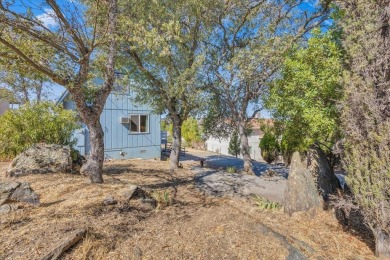 Discover a slice of vintage charm in this affordable barn-style on The Club at Copper Valley Golf Course in California - for sale on GolfHomes.com, golf home, golf lot
