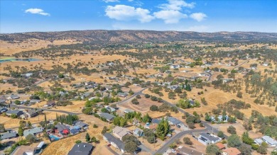 Discover a slice of vintage charm in this affordable barn-style on The Club at Copper Valley Golf Course in California - for sale on GolfHomes.com, golf home, golf lot