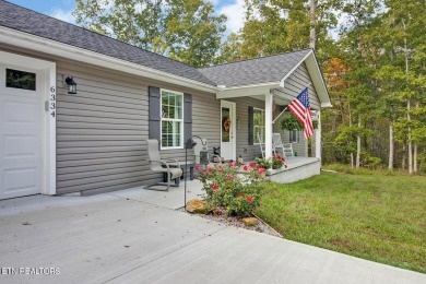 This stunning low-maintenance home is less than 3 years old and on Lake Tansi Village Country Club in Tennessee - for sale on GolfHomes.com, golf home, golf lot