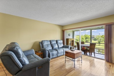 Beautiful & Bright 2-Bedroom, 2-Bath Condo with Serene Canal on Inverrary Country Club in Florida - for sale on GolfHomes.com, golf home, golf lot