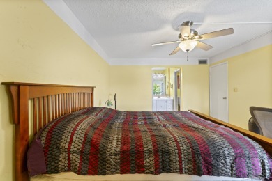 Beautiful & Bright 2-Bedroom, 2-Bath Condo with Serene Canal on Inverrary Country Club in Florida - for sale on GolfHomes.com, golf home, golf lot