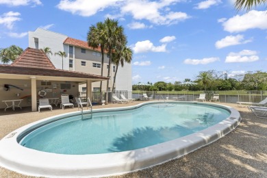 Beautiful & Bright 2-Bedroom, 2-Bath Condo with Serene Canal on Inverrary Country Club in Florida - for sale on GolfHomes.com, golf home, golf lot