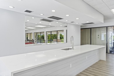 Beautiful & Bright 2-Bedroom, 2-Bath Condo with Serene Canal on Inverrary Country Club in Florida - for sale on GolfHomes.com, golf home, golf lot