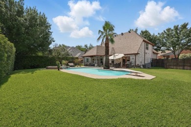 THIS ONE HAS IT ALL! Located on a quiet street in the Fox Pointe on Trophy Club of Dallas in Texas - for sale on GolfHomes.com, golf home, golf lot