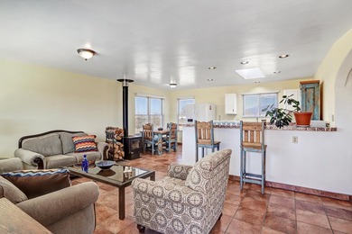 Enjoy the beauty and lifestyle of Ranchos de Taos from this on Taos Country Club in New Mexico - for sale on GolfHomes.com, golf home, golf lot