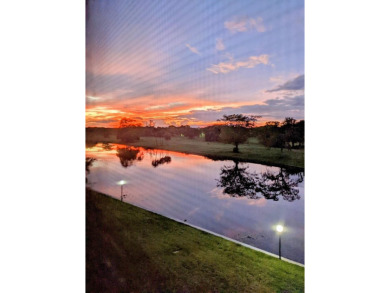 Beautiful & Bright 2-Bedroom, 2-Bath Condo with Serene Canal on Inverrary Country Club in Florida - for sale on GolfHomes.com, golf home, golf lot