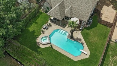 THIS ONE HAS IT ALL! Located on a quiet street in the Fox Pointe on Trophy Club of Dallas in Texas - for sale on GolfHomes.com, golf home, golf lot