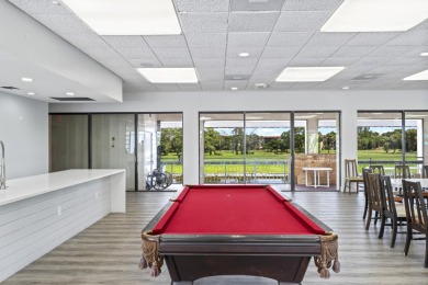 Beautiful & Bright 2-Bedroom, 2-Bath Condo with Serene Canal on Inverrary Country Club in Florida - for sale on GolfHomes.com, golf home, golf lot