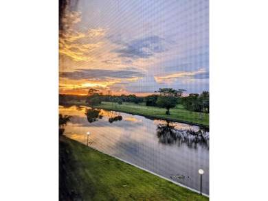 Beautiful & Bright 2-Bedroom, 2-Bath Condo with Serene Canal on Inverrary Country Club in Florida - for sale on GolfHomes.com, golf home, golf lot