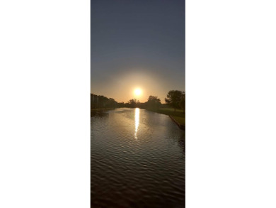 Beautiful & Bright 2-Bedroom, 2-Bath Condo with Serene Canal on Inverrary Country Club in Florida - for sale on GolfHomes.com, golf home, golf lot